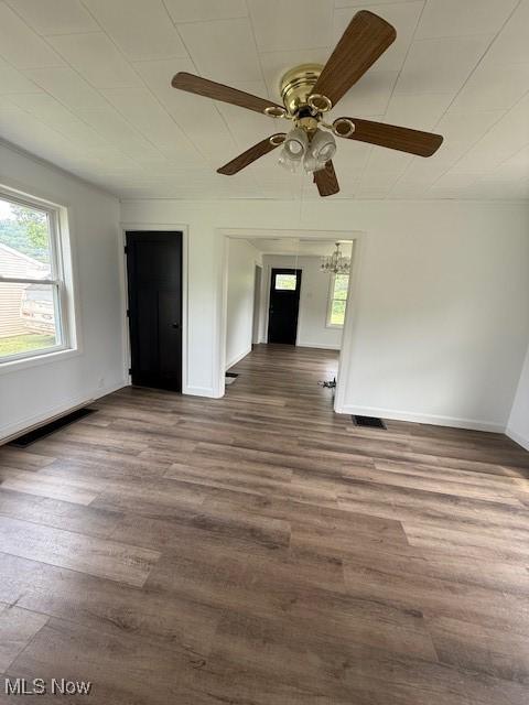 637 Maple St, Newcomerstown, OH 43832 - unfurnished room featuring wood finished floors and ceiling fan