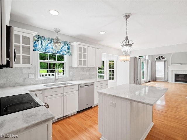 32969 Durrell Ave, Avon Lake, OH 44012 - kitchen featuring stainless steel appliances, a chandelier, glass insert cabinets, light wood-type flooring, and recessed lighting