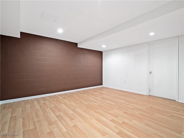 32969 Durrell Ave, Avon Lake, OH 44012 - spare room with light wood-style floors, recessed lighting, and concrete block wall