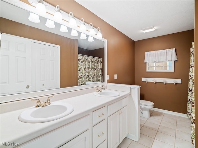 32969 Durrell Ave, Avon Lake, OH 44012 - bathroom with double vanity, tile patterned floors, and a shower with curtain