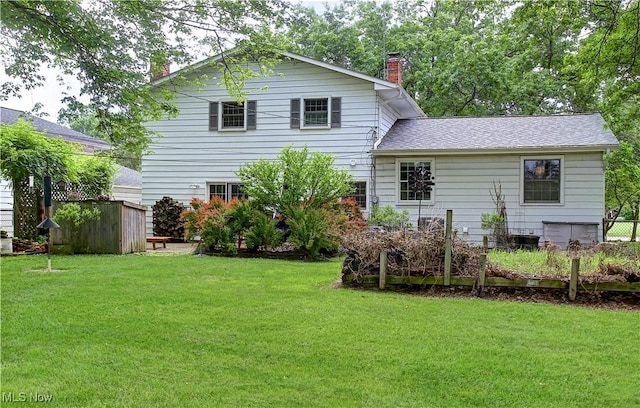 27008 Sweetbriar Dr, North Olmsted, OH 44070 - back of property featuring a chimney