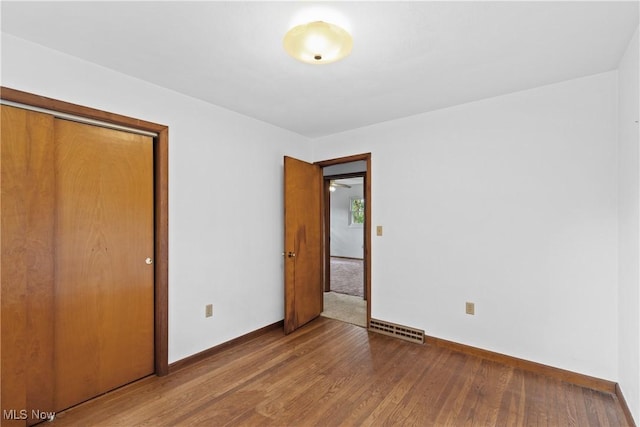 59937 Broadview Rd, Shadyside, OH 43947 - unfurnished bedroom featuring wood finished floors and a closet