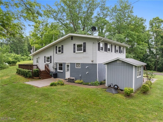 59937 Broadview Rd, Shadyside, OH 43947 - back of house featuring a yard, a patio area, a deck, and view of scattered trees