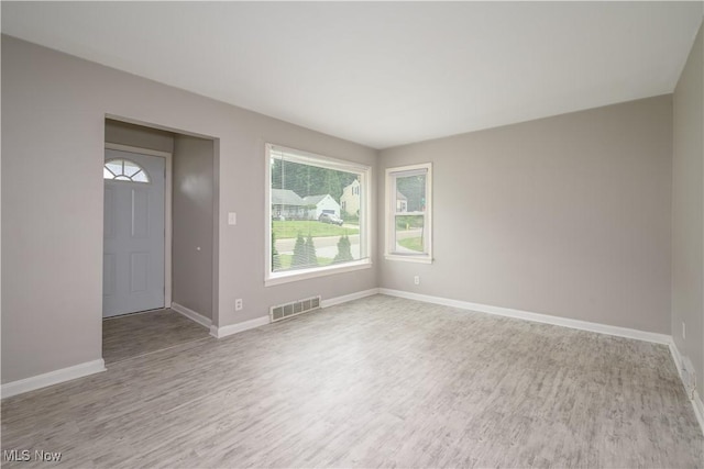 810 Indian Trl, Akron, OH 44314 - spare room featuring wood finished floors