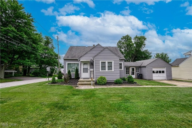 810 Indian Trl, Akron, OH 44314 - view of front facade featuring an attached garage, concrete driveway, a front yard, and roof with shingles