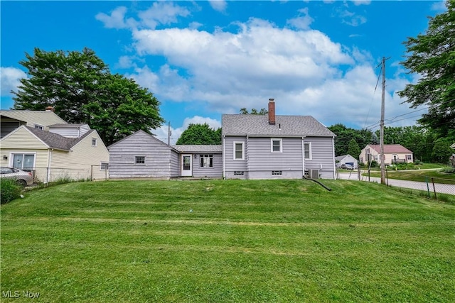810 Indian Trl, Akron, OH 44314 - back of house with a chimney
