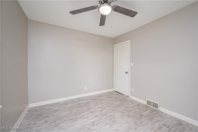 810 Indian Trl, Akron, OH 44314 - spare room featuring wood finished floors and a ceiling fan