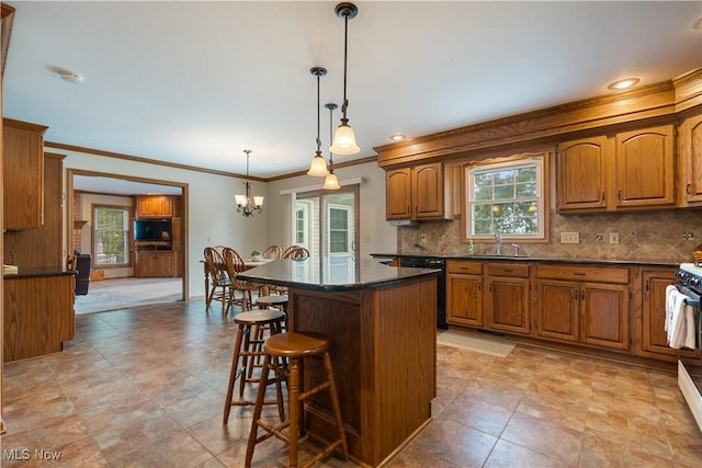 6884 Mapleridge Cir NW, Canton, OH 44718 - kitchen with dishwasher, brown cabinets, a breakfast bar, crown molding, and backsplash