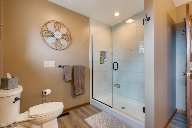 6884 Mapleridge Cir NW, Canton, OH 44718 - full bath with wood finished floors, a shower stall, and recessed lighting