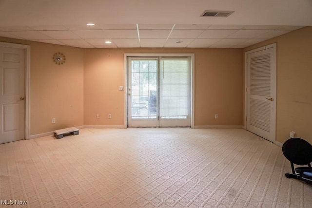 6202 Rockside Cir NW, Canton, OH 44718 - spare room featuring a paneled ceiling, light carpet, and recessed lighting