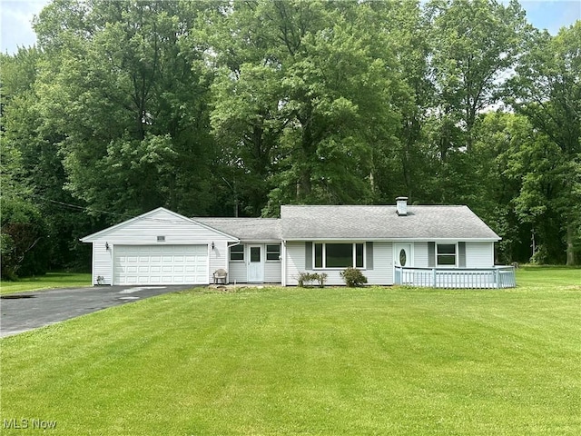 2178 Hewitt Gifford Rd SW, Warren, OH 44481 - single story home featuring asphalt driveway, a garage, a front yard, and a porch