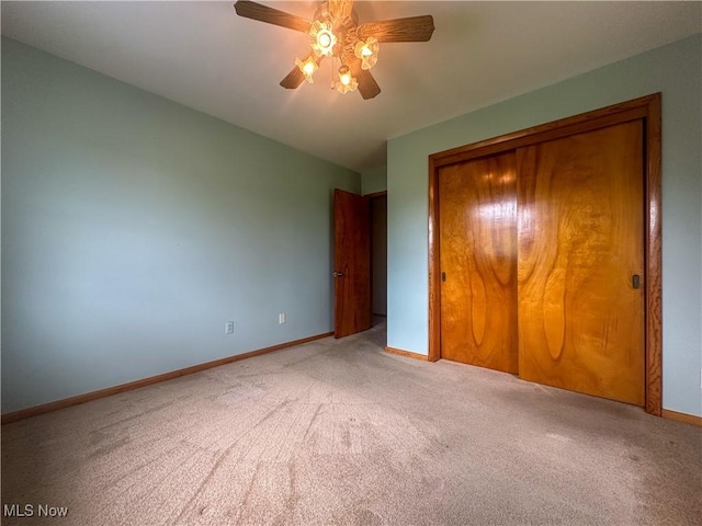 2178 Hewitt Gifford Rd SW, Warren, OH 44481 - unfurnished bedroom with light carpet, a closet, and ceiling fan