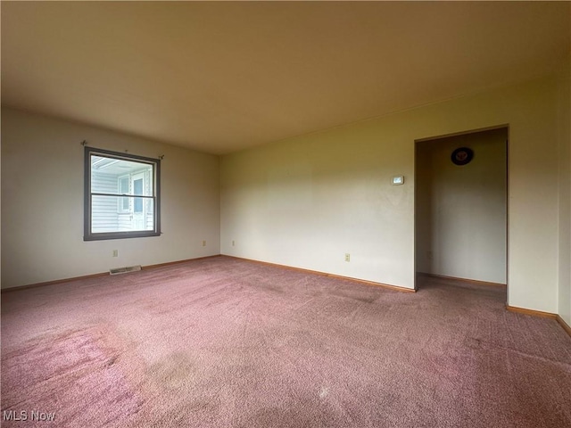 2178 Hewitt Gifford Rd SW, Warren, OH 44481 - carpeted empty room featuring baseboards