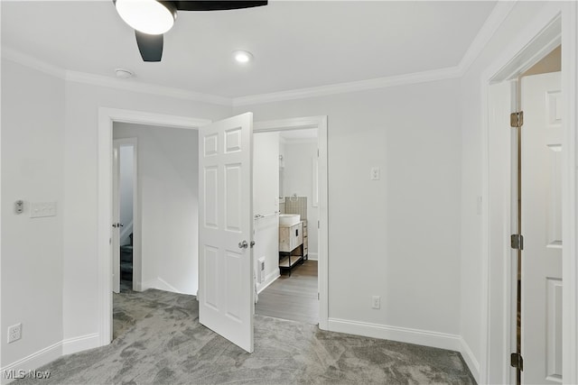 848 Kling St, Akron, OH 44311 - unfurnished bedroom featuring crown molding, carpet flooring, and a ceiling fan
