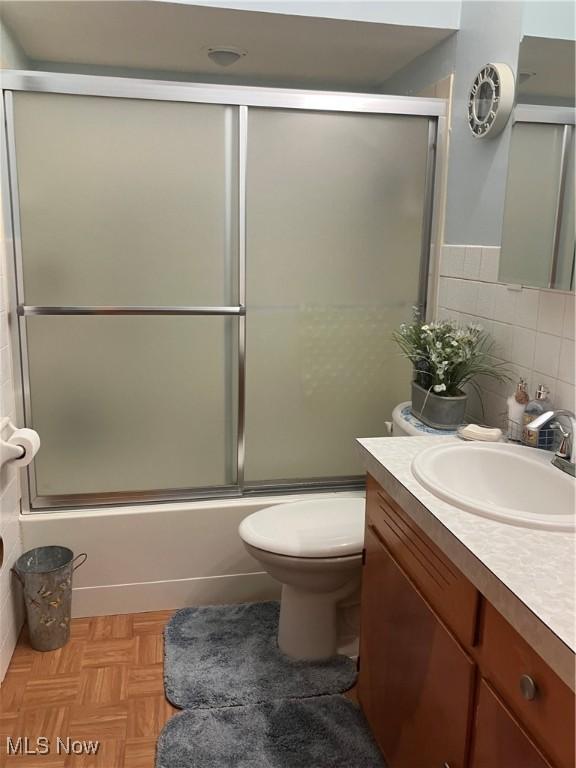 723 High Ave, Niles, OH 44446 - bathroom with vanity and bath / shower combo with glass door