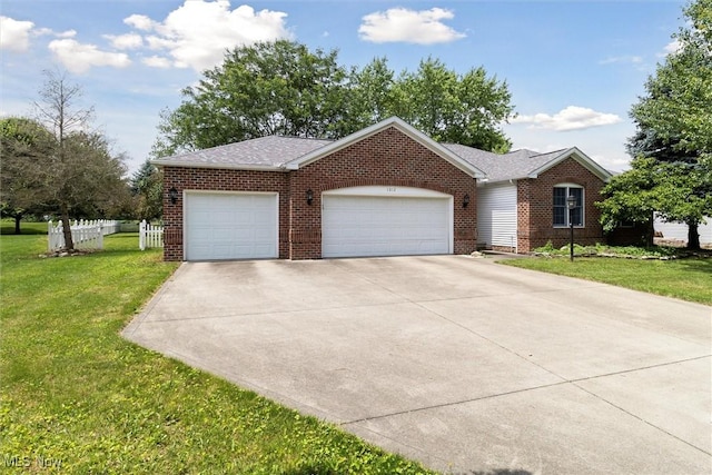 1012 Woodland Chase, Grafton, OH 44044 - ranch-style house with brick siding, driveway, and a garage