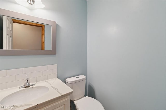 1012 Woodland Chase, Grafton, OH 44044 - half bath featuring vanity and backsplash