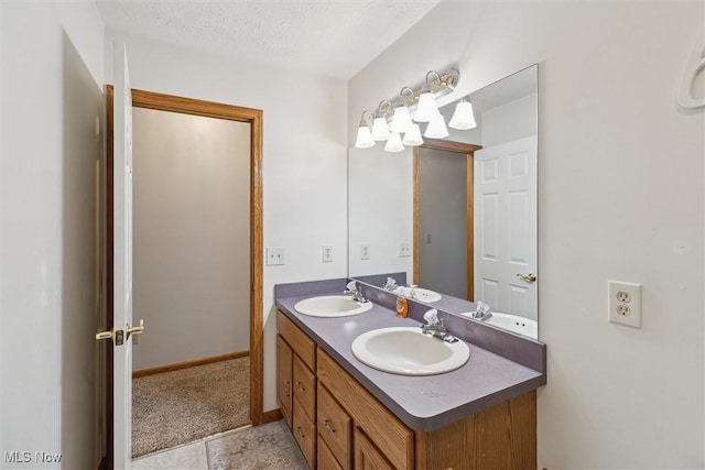 1012 Woodland Chase, Grafton, OH 44044 - full bath featuring double vanity and a textured ceiling