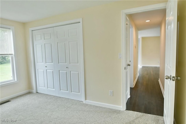 22 Camrose Dr, Niles, OH 44446 - unfurnished bedroom featuring a closet, multiple windows, carpet flooring, and recessed lighting