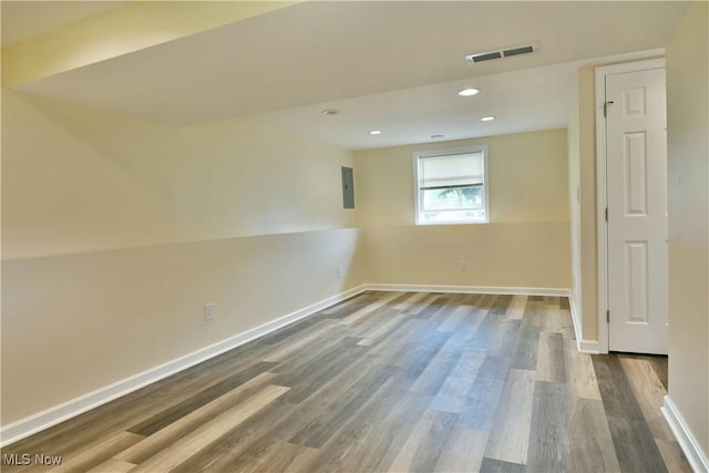 22 Camrose Dr, Niles, OH 44446 - empty room with wood finished floors, electric panel, and recessed lighting