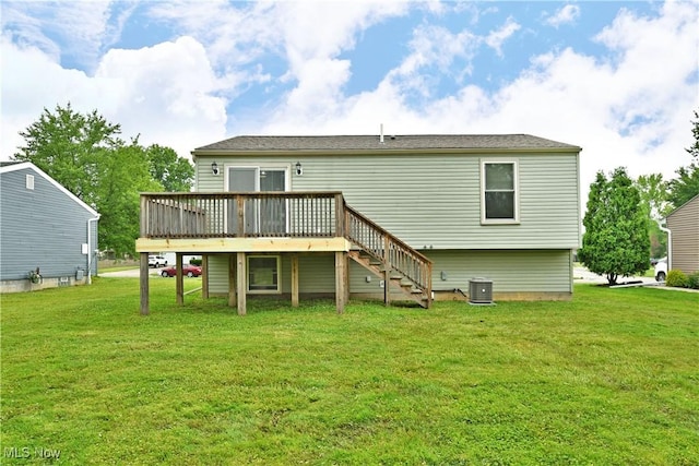 22 Camrose Dr, Niles, OH 44446 - back of property with a wooden deck, a lawn, and stairs