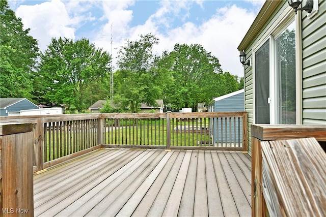 22 Camrose Dr, Niles, OH 44446 - wooden terrace featuring view of scattered trees and a lawn