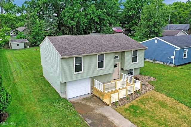 22 Camrose Dr, Niles, OH 44446 - bi-level home featuring an attached garage, a shingled roof, concrete driveway, and a front yard