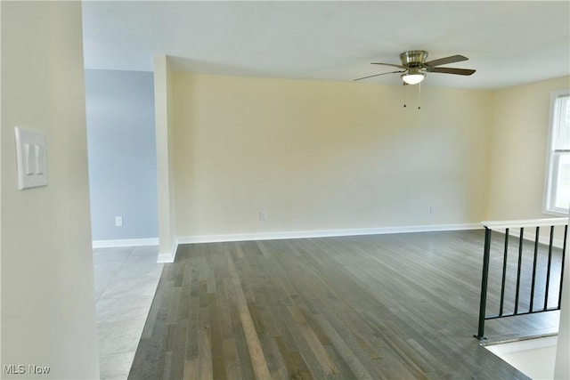 22 Camrose Dr, Niles, OH 44446 - empty room featuring a ceiling fan and dark wood-style flooring