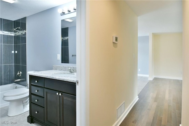 22 Camrose Dr, Niles, OH 44446 - full bathroom with vanity, washtub / shower combination, and wood finished floors