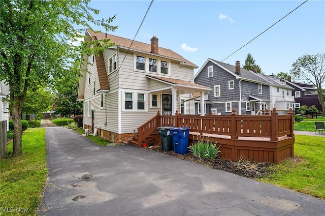 3382 Ormond Rd, Cleveland Heights, OH 44118 - back of house featuring a chimney and a wooden deck