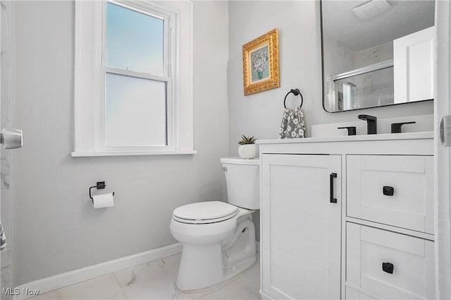 3382 Ormond Rd, Cleveland Heights, OH 44118 - bathroom featuring marble look tile flooring, vanity, and a shower with shower door
