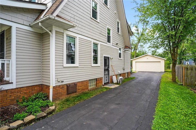 3382 Ormond Rd, Cleveland Heights, OH 44118 - view of property exterior with a garage and an outdoor structure