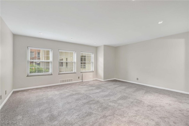 15875 Van Aken Blvd Unit 101C, Shaker Heights, OH 44120 - empty room featuring carpet floors and recessed lighting