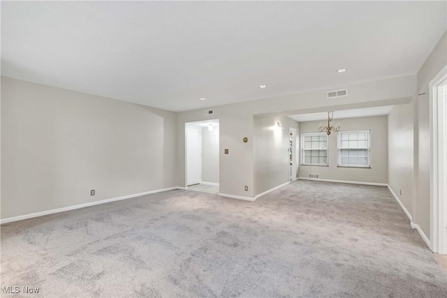 15875 Van Aken Blvd Unit 101C, Shaker Heights, OH 44120 - empty room with a chandelier, carpet, and recessed lighting