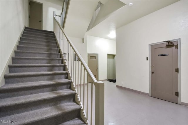 15875 Van Aken Blvd Unit 101C, Shaker Heights, OH 44120 - stairway featuring baseboards