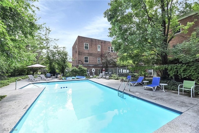 15875 Van Aken Blvd Unit 101C, Shaker Heights, OH 44120 - community pool with a patio area