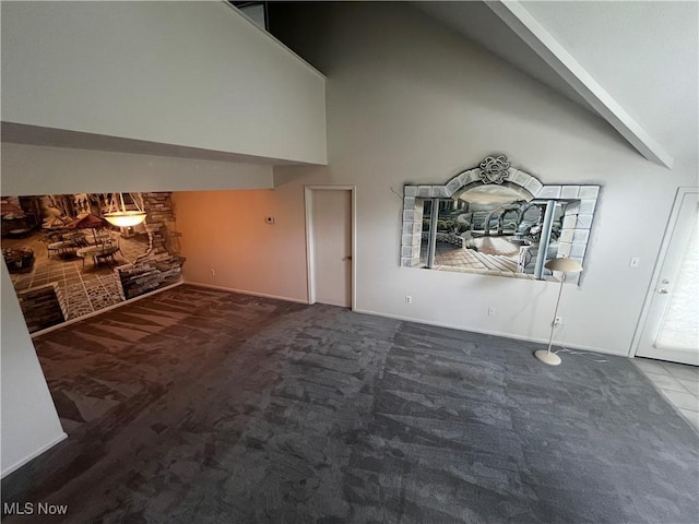 1235 Canyon View Rd, Sagamore Hills, OH 44067 - unfurnished living room featuring carpet floors and high vaulted ceiling