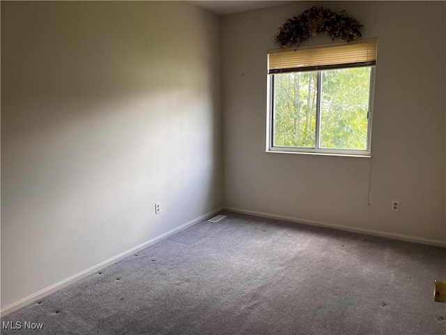 1235 Canyon View Rd, Sagamore Hills, OH 44067 - carpeted spare room featuring baseboards
