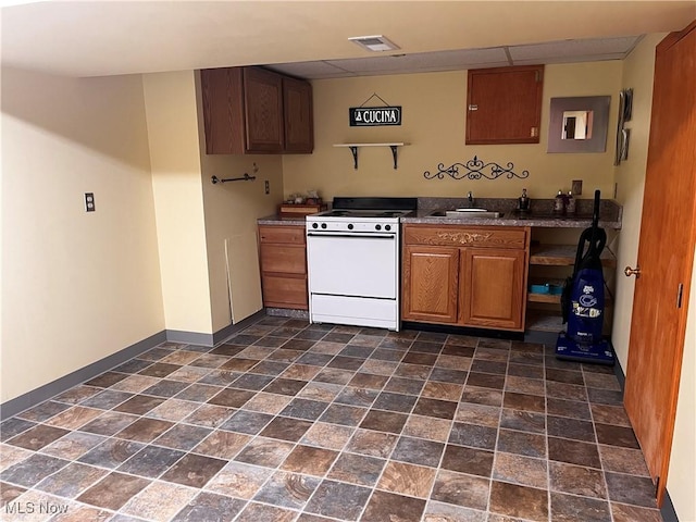 1235 Canyon View Rd, Sagamore Hills, OH 44067 - kitchen with white range, dark stone finish flooring, dark countertops, open shelves, and brown cabinetry