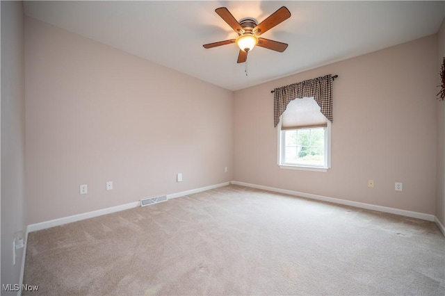 125 Fitch Blvd Unit 263, Austintown, OH 44515 - empty room featuring light carpet and a ceiling fan