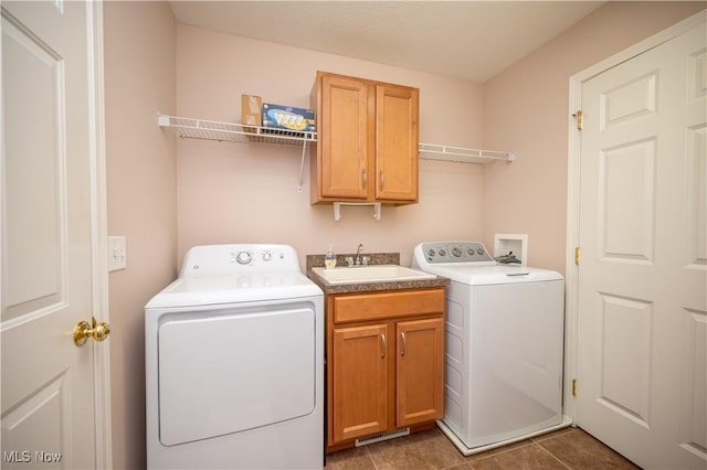 125 Fitch Blvd Unit 263, Austintown, OH 44515 - laundry area with separate washer and dryer, cabinet space, and tile patterned floors