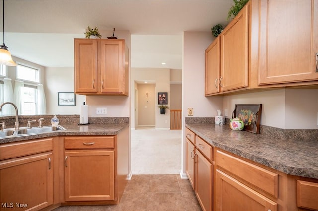 125 Fitch Blvd Unit 263, Austintown, OH 44515 - kitchen featuring dark countertops, hanging light fixtures, light tile patterned floors, light colored carpet, and recessed lighting