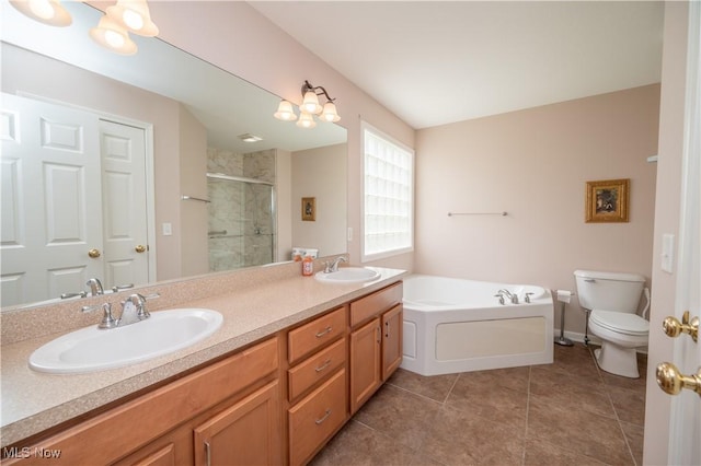 125 Fitch Blvd Unit 263, Austintown, OH 44515 - bathroom featuring a shower stall, double vanity, a bath, and tile patterned flooring