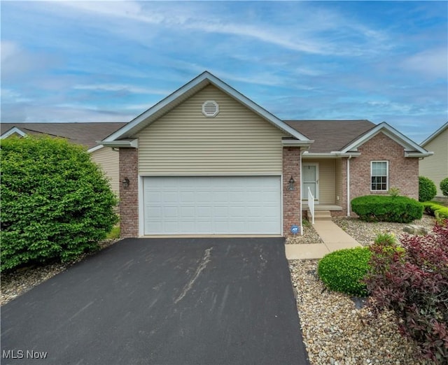 125 Fitch Blvd Unit 263, Austintown, OH 44515 - ranch-style home featuring driveway, brick siding, and an attached garage