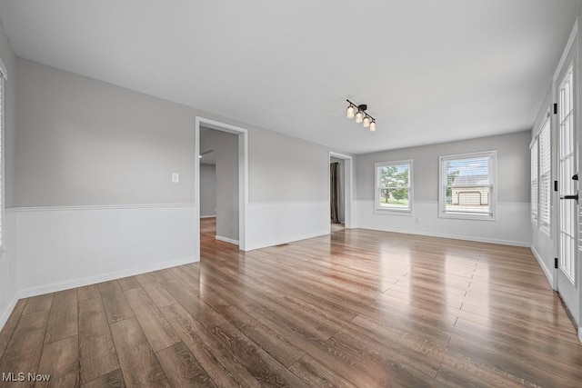 2515 Saratoga Ave SW, Canton, OH 44706 - unfurnished room featuring wood finished floors and baseboards