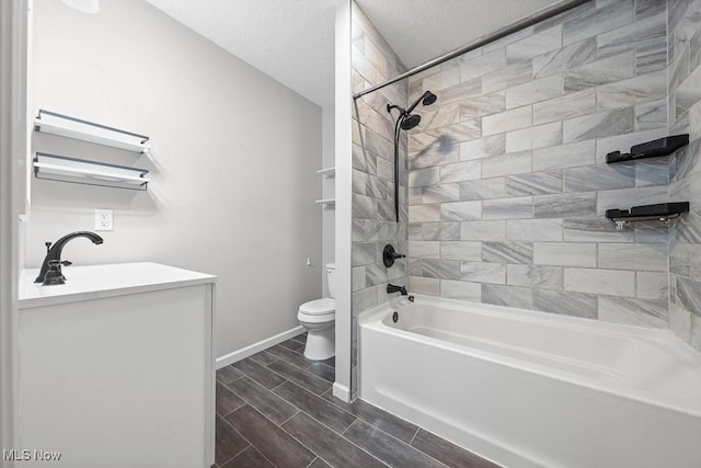2515 Saratoga Ave SW, Canton, OH 44706 - bathroom with vanity, tub / shower combination, and wood finish floors