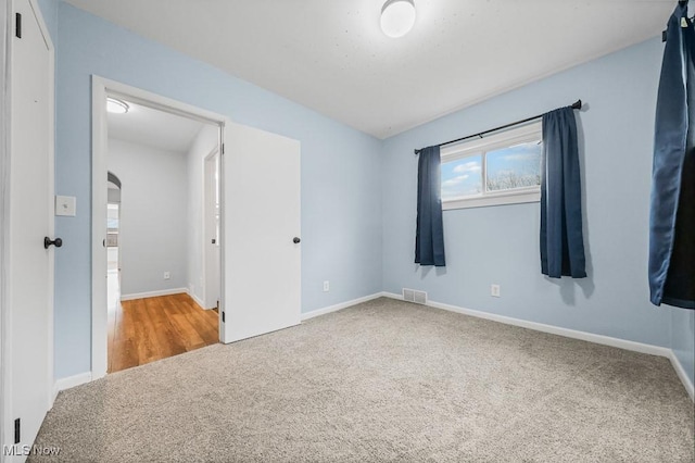 2515 Saratoga Ave SW, Canton, OH 44706 - unfurnished bedroom featuring carpet and baseboards