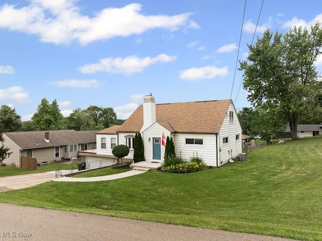 2515 Saratoga Ave SW, Canton, OH 44706 - bungalow with a chimney, driveway, and a shingled roof