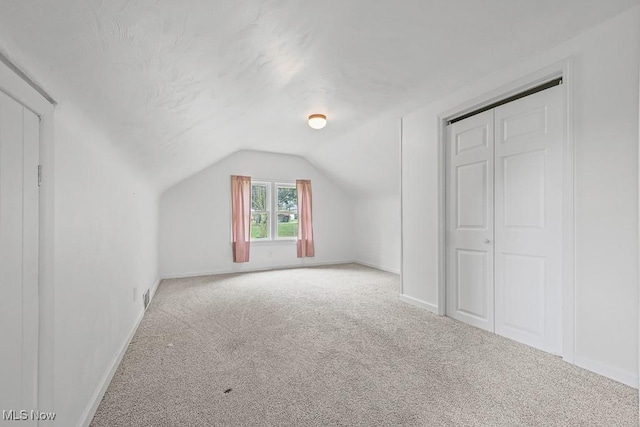 2515 Saratoga Ave SW, Canton, OH 44706 - additional living space featuring carpet floors and vaulted ceiling
