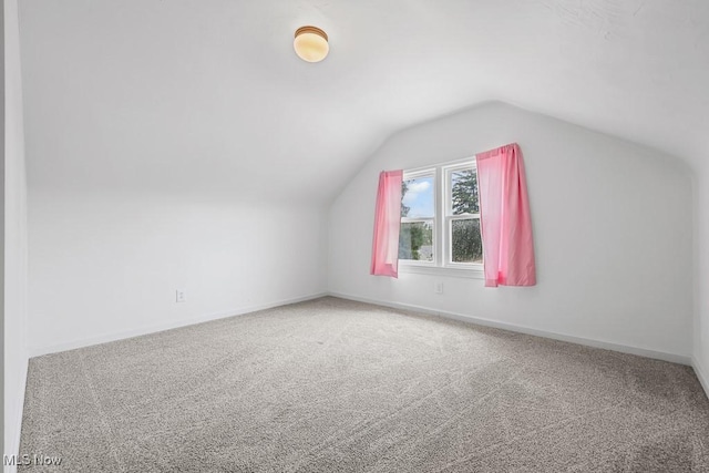 2515 Saratoga Ave SW, Canton, OH 44706 - additional living space with carpet flooring and vaulted ceiling